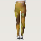 Ein goldenes Weihnachtsmuster auf dem Braun Leggings (Vorderseite)