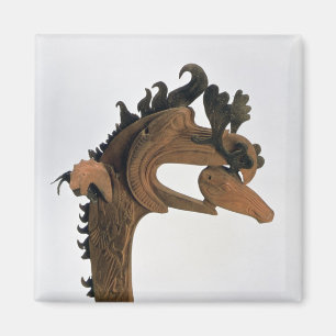 Ein Greif, der ein Rotwild in seinem Schnabel häl Magnet
