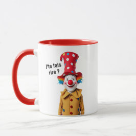 Ein großer mehrfarbiger Clown mit einer großen rot Tasse