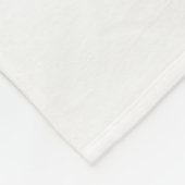 ein grün-weißes Logo mit einem stilisierten Design Fleecedecke (Ecke)