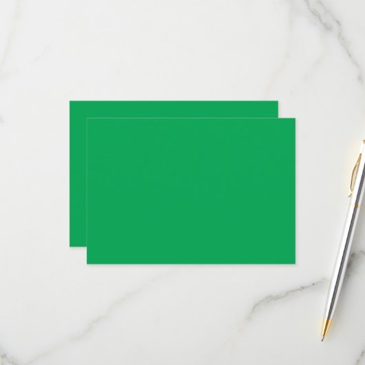 ein grüner Hintergrund mit RSVP Karte (Vorderseite/Rückseite Beispiel)