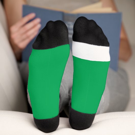 ein grüner Hintergrund mit Socken (Unterseite)