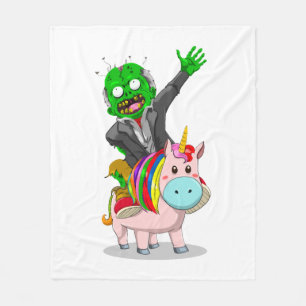 Ein grüner Zombie fährt auf einem niedlich rosa Ei Fleecedecke