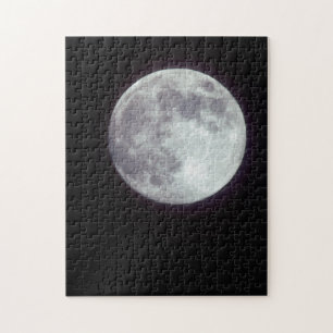 Ein heller Vollmond in einem schwarzen Nachthimmel Puzzle