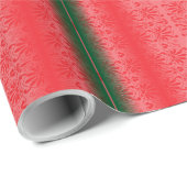 Ein hellroter Apfel sitzt auf einer schlichten, we Geschenkpapier (Rolleneckpunkt)