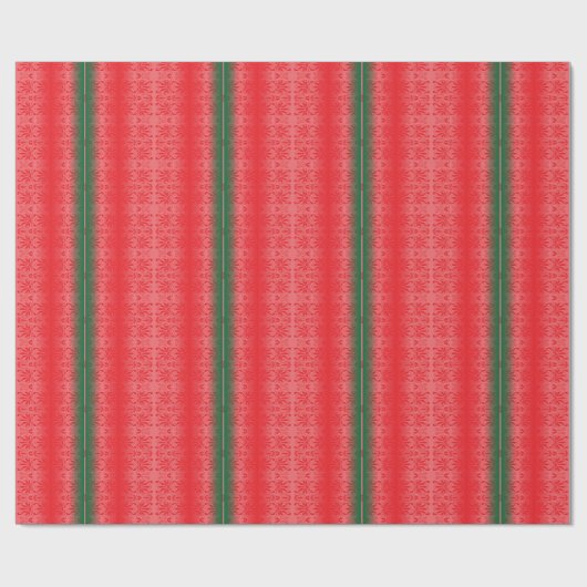 Ein hellroter Apfel sitzt auf einer schlichten, we Geschenkpapier (Flach)