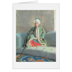 Ein Herr gesetzt auf einer Couch