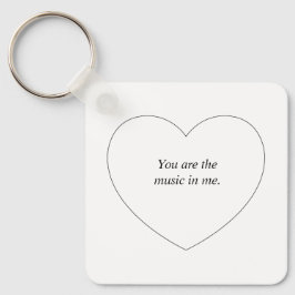 Ein herzförmiger personalisierter Text Schlüsselanhänger