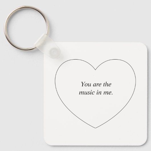 Ein herzförmiger personalisierter Text Schlüsselanhänger (Vorderseite)