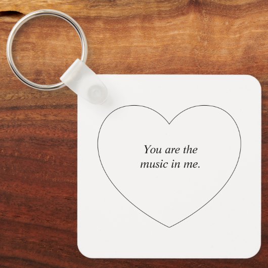 Ein herzförmiger personalisierter Text Schlüsselanhänger (Vorderseite)