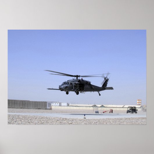 Ein HH-60G Pave Hawk startet vom Camp Bastio Poster (Vorne)