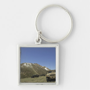 Ein Humvee wird am Ort der erneuten Übermittlung g Schlüsselanhänger