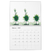 Ein Hündchen mit goldenem Retriever sitzt auf eine Kalender (Feb 2027)