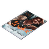 Ein kleines, etwas geflecktes 6,5" x 8,75" Spiraln Notizblock (Linke Seite)