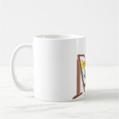 Ein kleines Mädchen mit einer Farben-Palette Kaffeetasse (Links)