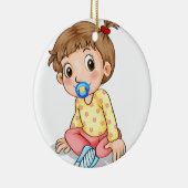 Ein Kleinkind mit einem Schnuller Keramikornament (Rechts)