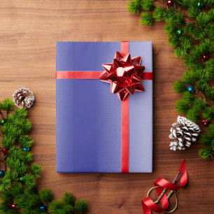 Ein kompliziertes, blaues geometrisches Muster mit Geschenkpapier