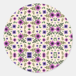 Ein kreisförmiges Blumenmuster zeigt lila und rosa Runder Aufkleber