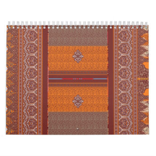 ein Kreuzstich in orange und braun Kalender