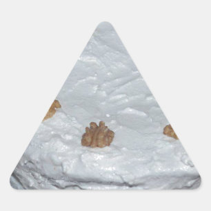 Ein Kuchen mit Zuckerguss Dreieckiger Aufkleber