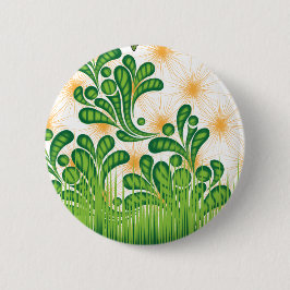 Ein künstlerisches Muster in Grün und Gold, das ei Button