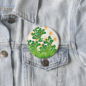 Ein künstlerisches Muster in Grün und Gold, das ei Button (Beispiel)