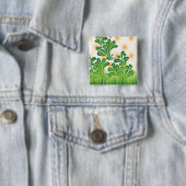 Ein künstlerisches Muster in Grün und Gold, das ei Button (Beispiel)