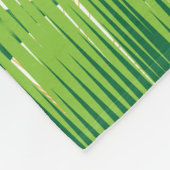 Ein künstlerisches Muster in Grün und Gold, das ei Fleecedecke (Ecke)