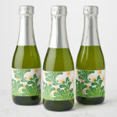 Ein künstlerisches Muster in Grün und Gold, das ei Schaumweinetikett (Flaschen)