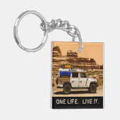 EIN LEBEN. LIVE ES. SCHLÜSSELANHÄNGER (Vorderseite links)