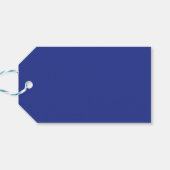 Ein lebendiger, blauer Hintergrund mit einem weiße Geschenkanhänger (Rückseite Horizontal)