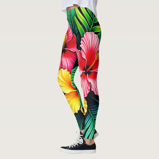 Ein lebendiger tropischer Hibiskus Leggings (Links)