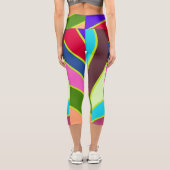 Ein lebendiges, farbenfroh gestreiftes Stoffmuster Capri Leggings (Rückseite)