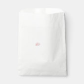 Ein lebendiges rot-schwarzes Blumendesign mit Geschenktütchen (Vorderseite)