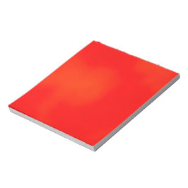 Ein lebendiges rotes Notizbuch mit einer subtilen Notizblock