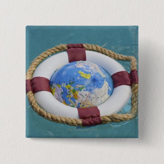 Ein lebenserhaltender und treibender Globus Button (Vorderseite)