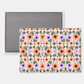 Ein lebhaftes Blumenmuster zeigt orangefarbene  Magnet (Vorderseite/Rückseite)