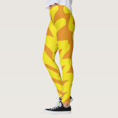 Ein lebhaftes orangefarbenes "Ratti_Creative_Arts" Leggings (Links)