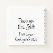 Ein Lehrer nimmt die Hand Notizblock (Rückseite)