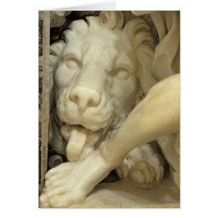 Ein Löwe, der den Fuß von Daniel leckt