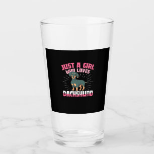 Ein Mädchen, das Dackel Lieben Glas