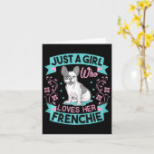 Ein Mädchen, das ihren französischen Bulldoggen Li Karte (Gelbe Blume)