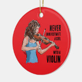 Ein Mädchen mit einem Violinenschmuck Keramik Ornament (Links)