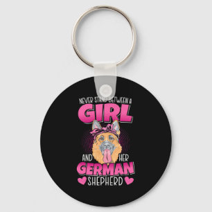 Ein Mädchen und ein deutscher Schäferhund Schlüsselanhänger