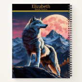 Ein majestätischer Wolf, der auf dem glühenden Vol Notizblock (Rückseite)