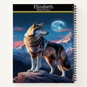 Ein majestätischer Wolf heult auf dem aufsteigende Notizblock (Rückseite)