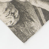 Ein Mann hebt die Legen eines anderen Mannes Fleecedecke (Ecke)