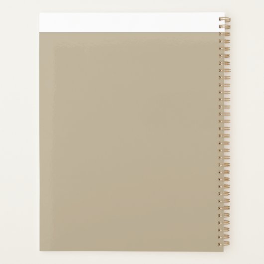 ein Mann in einem Anzug und Krawatte stehend vor e Planer (Rückseite)