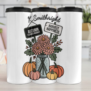 Ein Markt für Blume im Herbst und Pumpkin Thermosbecher
