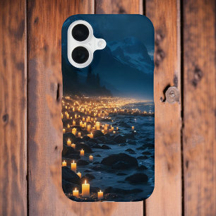 Ein Meer von Kerzenlichtern am Strand in der Dunke iPhone 16 Hülle